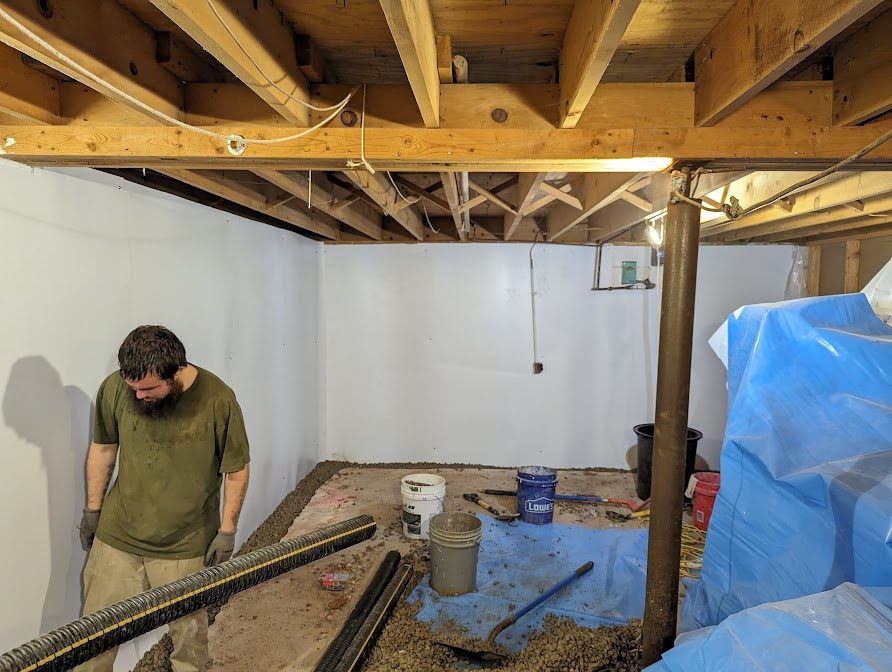Basement wall liner, pipe materials and worker