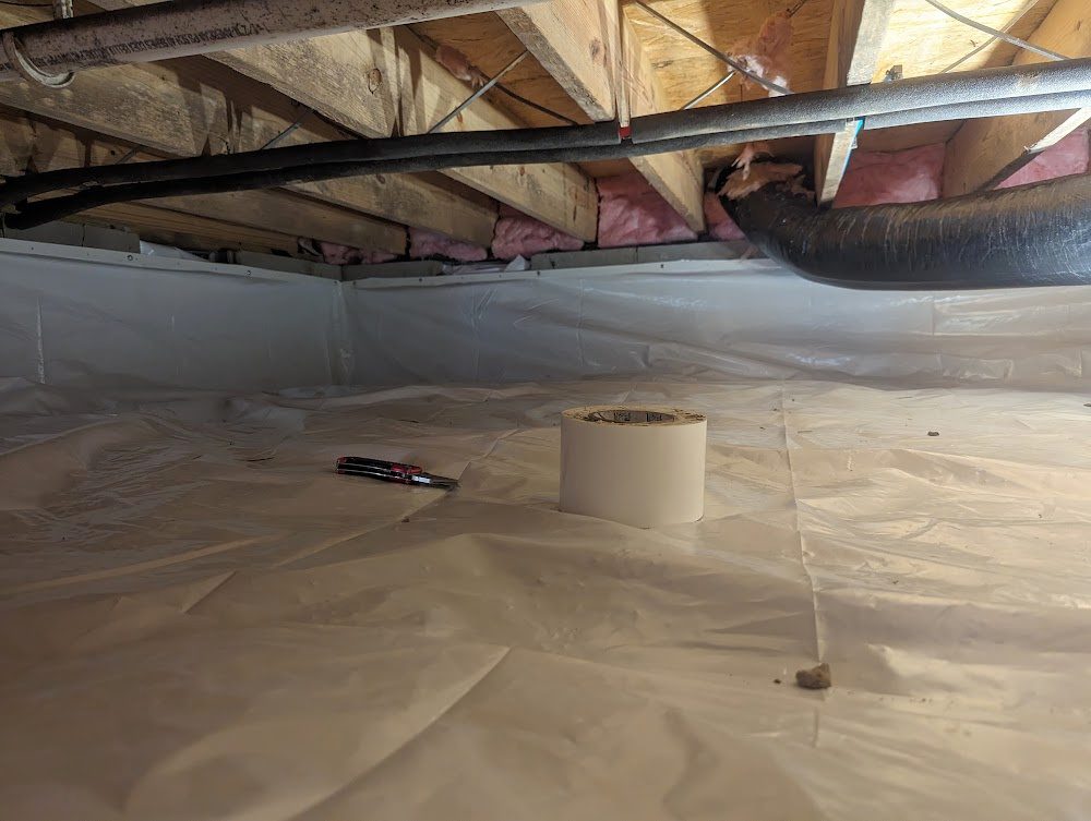Fresh white floor and wall liner with tape roll and tool