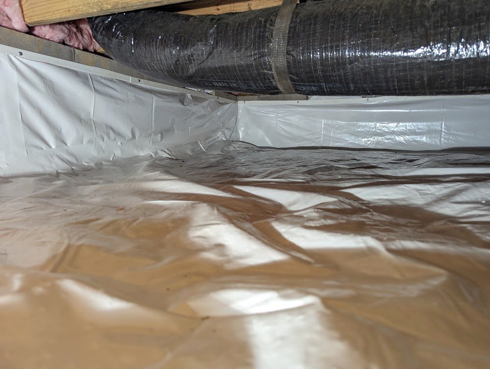 White perimeter liner and floor below dark duct