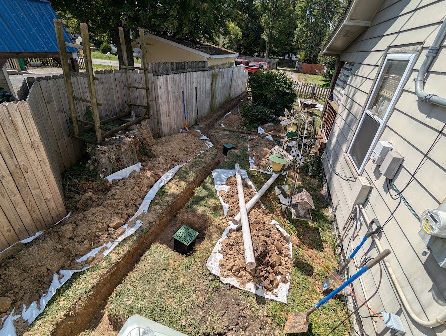 Several trenches around rear of home