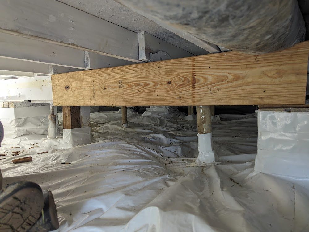 New lumber beam and adjustable post above a vapor liner