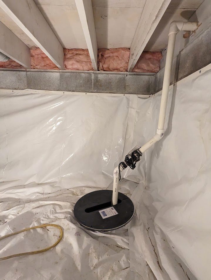 Sump cover and discharge pipe within white liner